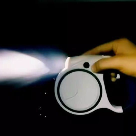 Laisse rétractable avec lampe intégrée